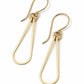 Pair of gold teardrop earrings on a gray fabric background