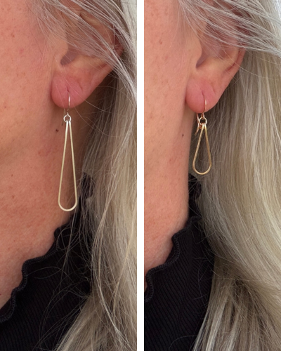 Side-by-side comparison of gold tear drop earrings worn by a person with light hair.