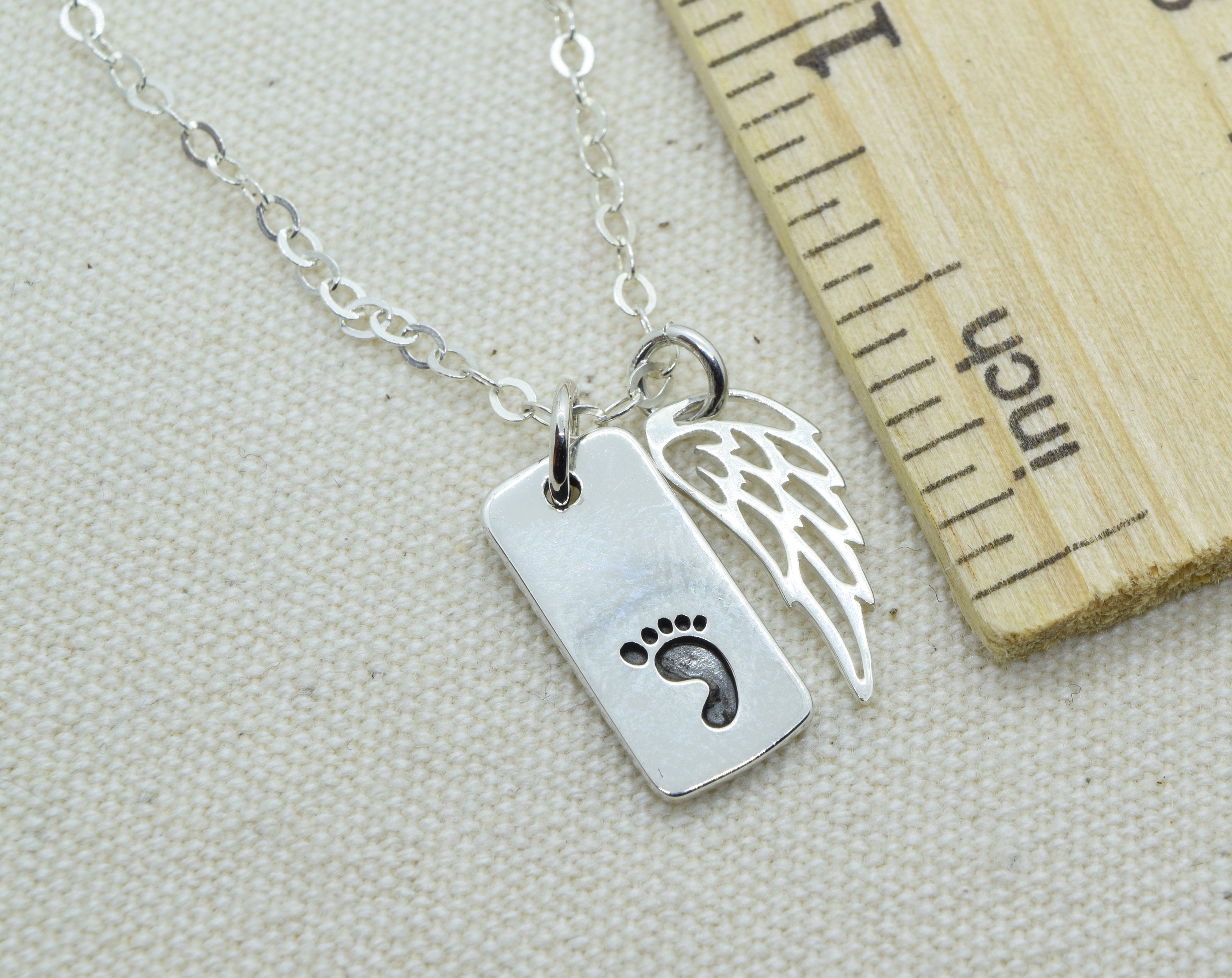 Foot store charm necklace