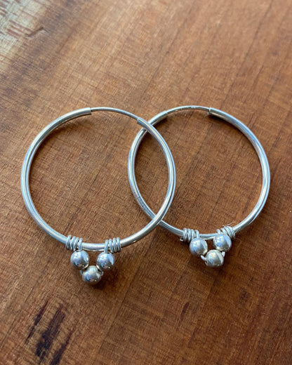 Endless Silver Hoop Earrings with Bead Accents - Cloverleaf Jewelry