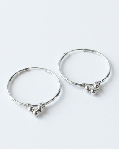Endless Silver Hoop Earrings with Bead Accents - Cloverleaf Jewelry